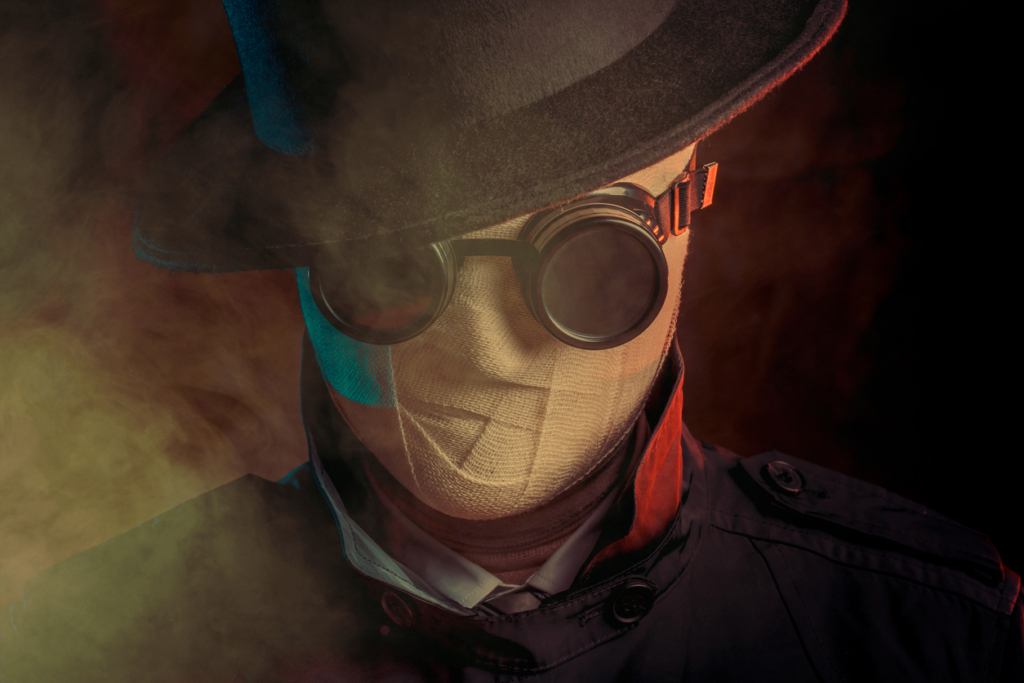 A man the represents a business with out a plan. This is an image of a man with bandages wrapping his face and dark welding goggles over his eyes. The invisble man.